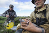 Russian ornithologists banding a Wandering Tattler.